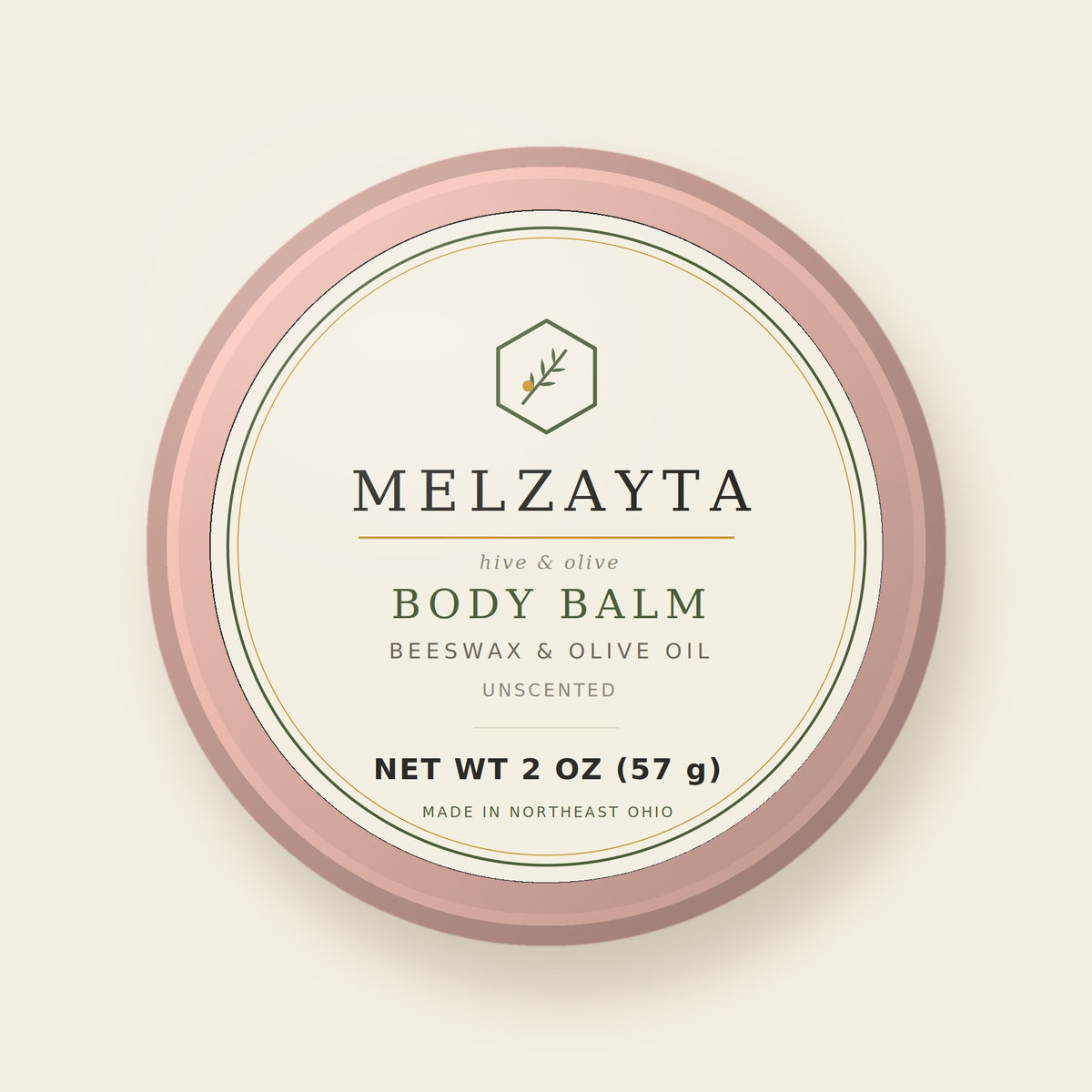 Melzayta Body Balm: closed rose-gold tin with the cream Body Balm label, beeswax and olive oil, 2 oz